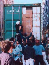 American Friends Service Committee volunteers loading blankets headed overseas in January 2002
